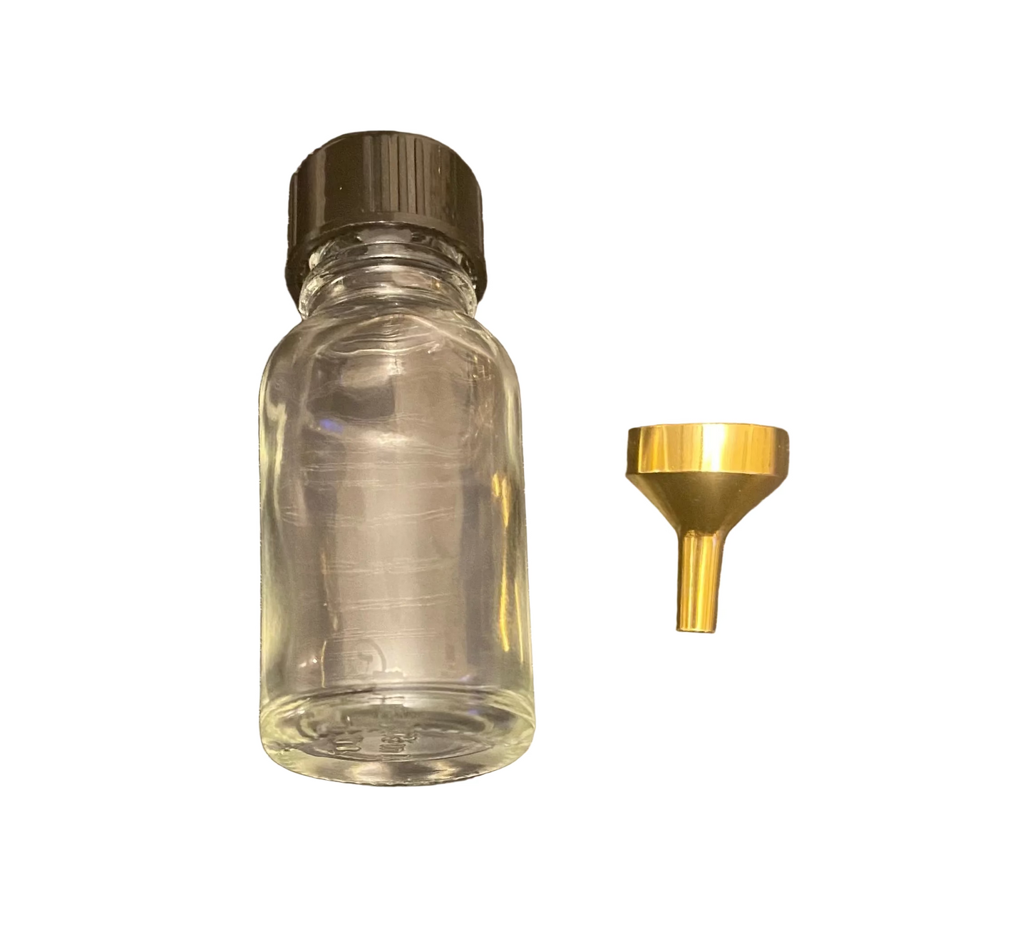 Oil bottle with funnel and fragrance oil