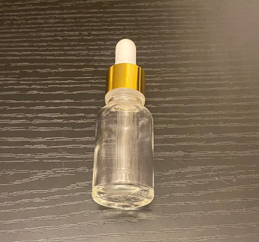 Oil bottle dropper with oil
